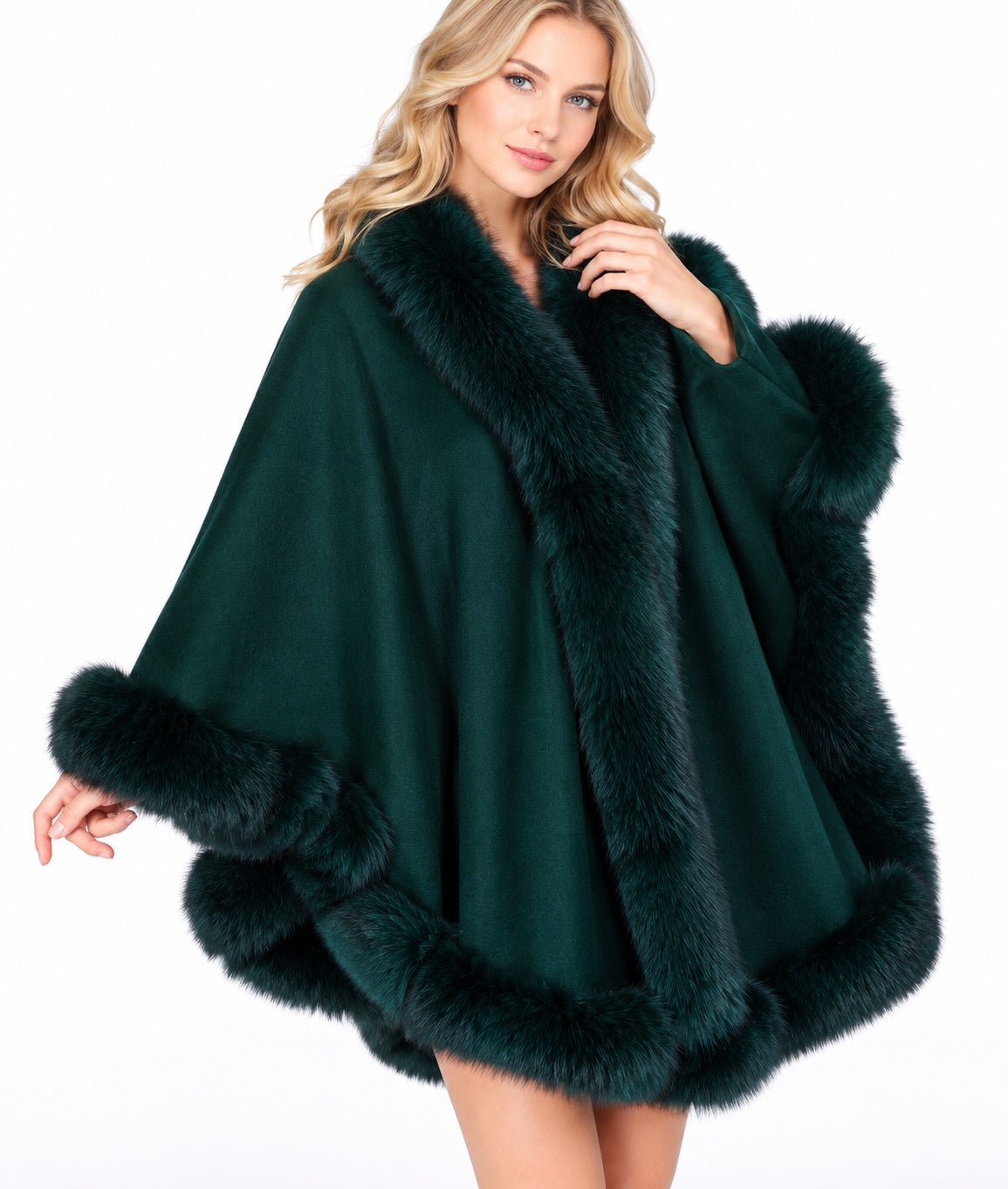 Model wearing the CA50 emerald green cashmere cape with fox fur trim